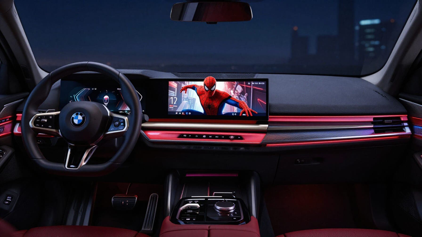 A BMW interior with a Spider-Man promotional video on the infotainment screen