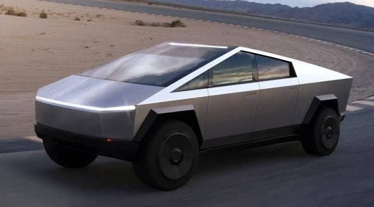 The Tesla Cybertruck, a futuristic pickup with sharp stainless steel panels